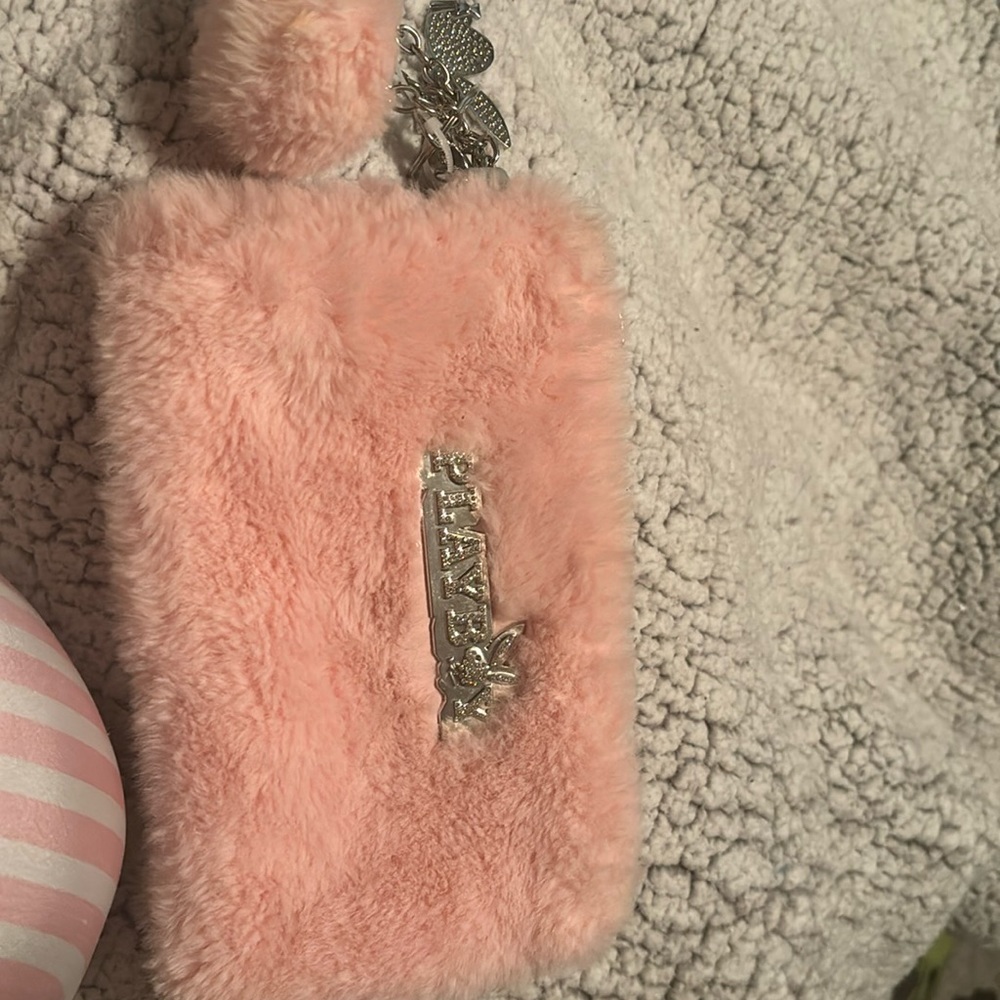 Like brand new used twice play boy bling hand purse